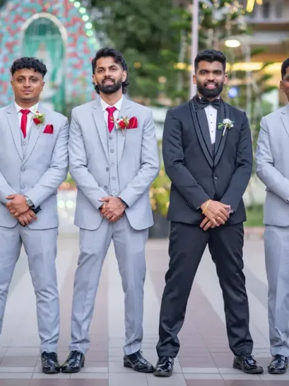 The groom and his groomsmen looking sharp. Capturing the camaraderie and fun of the wedding party is just as important as the couple's portraits.