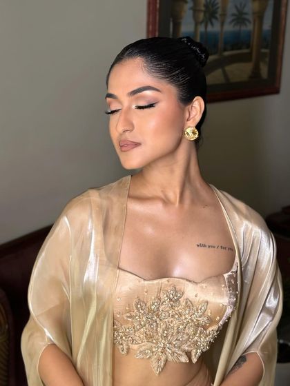 Another angle of the Latina glam, showing the flawless skin and perfect contour. This look is all about precision and creating a sculpted, defined face.