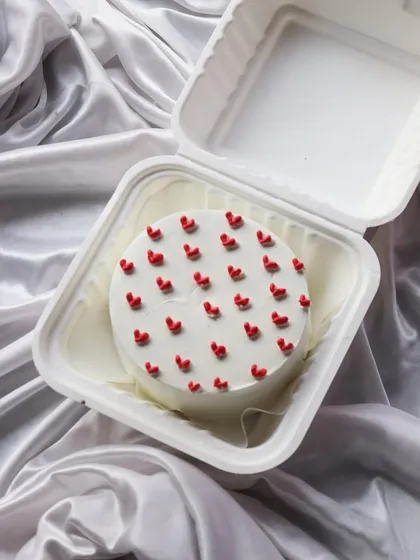 My tiny hearts bento cake is one of my most requested designs. It's simple, cute, and comes in a personal-sized box.