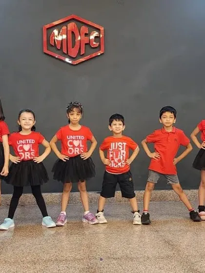 Our Summer Camp stars posing with confidence. Our camps are designed to be a productive and energetic experience, culminating in a showcase performance.