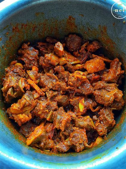 A close-up of my spicy buff curry, a rich and intensely flavorful dish.