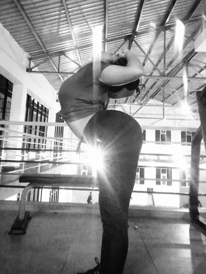 The same backbend with a sun flare, capturing the energy of the moment. Flexibility training is a journey of patience and listening to your body's limits.