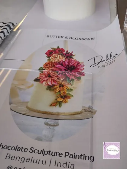 I'm always learning new things myself. I recently attended a workshop to learn how to sculpt flowers with chocolate cream. This is a printout of the dahlia design we learned to create.