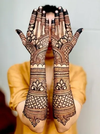 A beautiful pose showcasing a full-arm design with dense, traditional patterns. The symmetry and detail are key elements of my work.