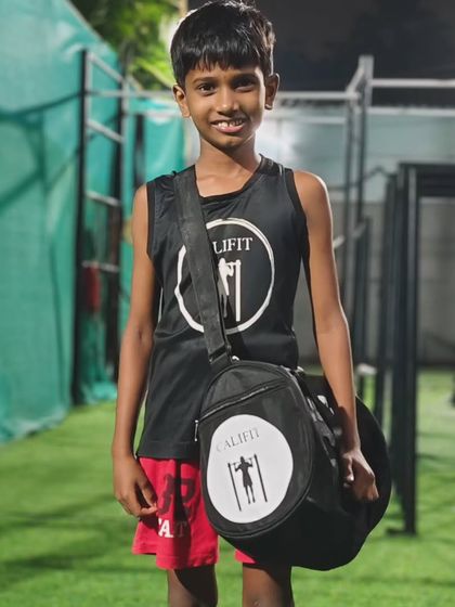 This young athlete is proud to be part of the Califit team, sporting his official gear.