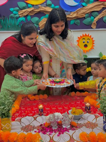 The children come together to hold the puja thali during our Diwali event. It's a beautiful way to teach them about unity and shared traditions.