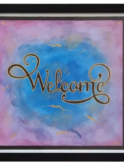 A simple and elegant "Welcome" sign designed to bring warmth to any entryway. I used a dreamy blend of pink and blue watercolors as the backdrop for the flowing, hand-painted script, all set in a clean black frame.