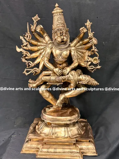 This Panchaloha icon of Ugra Narasimha captures the fierce and protective energy of Lord Vishnu's avatar. Crafting such a dynamic and multi-armed form requires immense precision, showcasing our mastery of the traditional Chola lost-wax casting method.