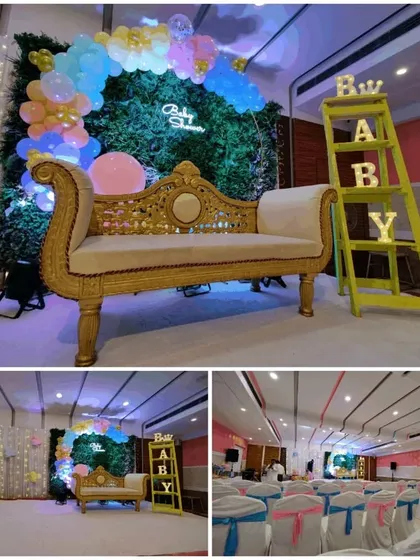 I create complete themed decor for baby showers, like this pink and blue setup. You can rent everything you see here, from the ornate golden sofa and green wall backdrop to the "BABY" marquee letters and matching chair covers for guests.
