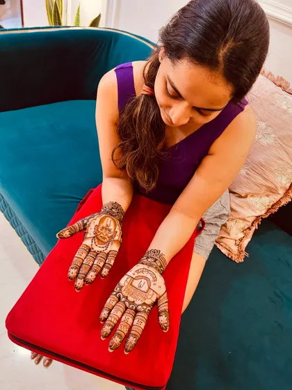 A happy client with her finished Swami Samarth mehendi. It's always a joy to create designs that hold such deep meaning for people.