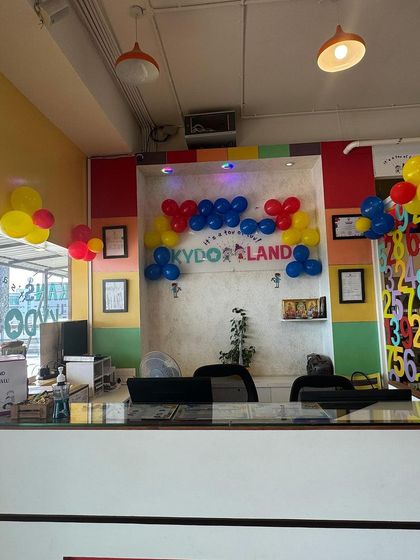 Our front desk is ready to welcome you. I make sure the entire space, starting from the entrance, feels cheerful and inviting for both kids and parents.