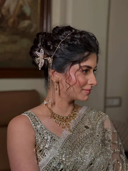 The client looking ethereal with her romantic updo. This style is perfect for showing off the details of a beautiful blouse and necklace.