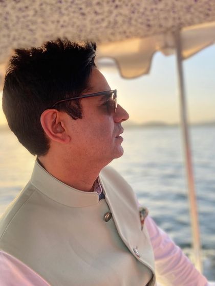 A close-up profile shot, bathed in the golden light of the setting sun. It's a moment of calm and reflection.