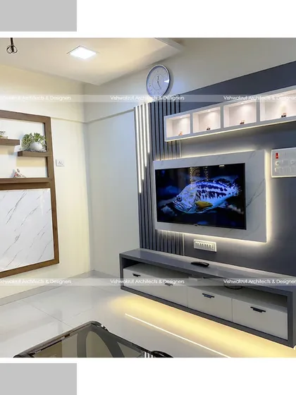 A full view of the TV unit and foldable dining area in the 1BHK apartment. This image clearly shows how multiple functions can be integrated into a single wall to maximize floor space.