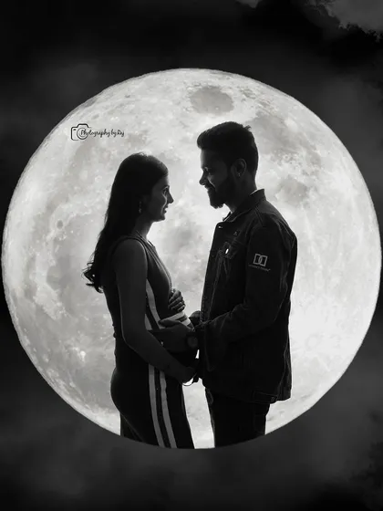 A romantic silhouette of a couple against a full moon backdrop, capturing a moment of quiet intimacy.