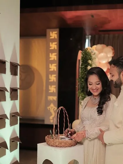 The happy parents-to-be sharing a sweet moment at the 'Baby Name Suggestions' wall. We love creating spaces that foster connection and create lasting memories.