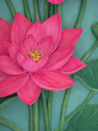 A close up view of the hand sculpted and painted lotus petals. Each petal is individually shaped and textured using ceramic paste to capture the delicate form of the flower, showing the level of detail that goes into every mural.