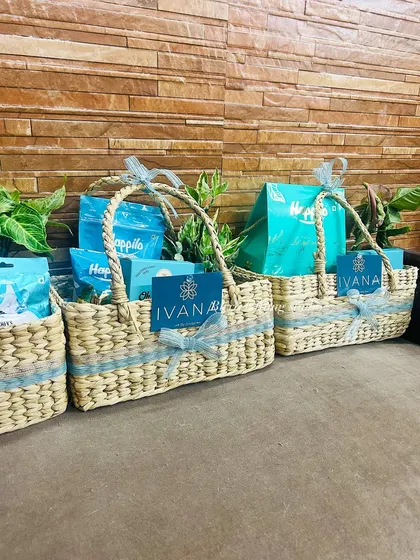 The Ivana by Jindals branded hampers lined up, showing the consistent and calming turquoise theme.