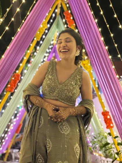 A happy bride laughing during her mehendi ceremony. These moments of joy are what I live for.