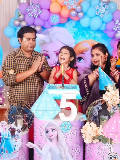 A magical 'Unicorn' themed birthday party, with pastel colors, shimmering backdrops, and unicorn illustrations, creating a whimsical and dreamy atmosphere.