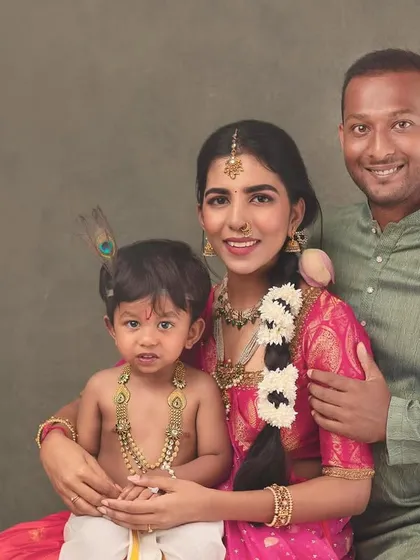 A slightly different take on the family portrait, with a hand-painted floral element in the background to add another layer of artistry and softness to the image.