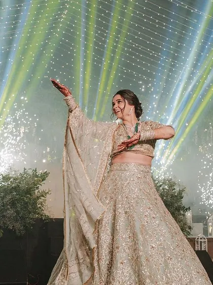 A stunning bride solo moment captured with pyrotechnics in the background. We help coordinate with planners to ensure your performance has maximum impact.