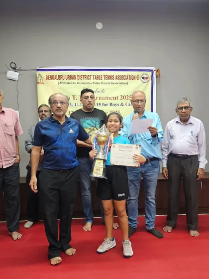 Anaya Agarwal holding her Runners Up trophy for the U13 Girls category at the Bengaluru Urban District Table Tennis Association tournament. Her passion and hard work are an inspiration.