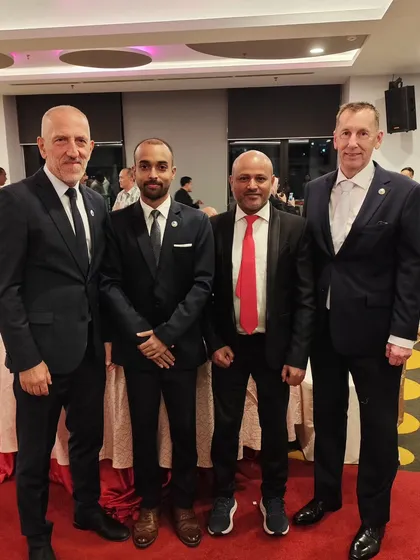 Standing with esteemed masters and officials. Being in the company of such experienced leaders is always a profound learning experience.