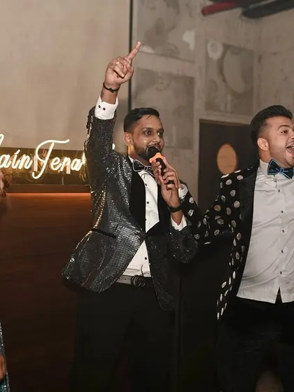 A candid shot from a cocktail party where the energy is palpable. As your host, I'm right there with you, making sure the fun never stops.