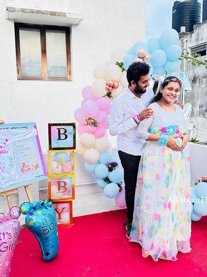 A lovely portrait of the expecting couple at their baby shower, a beautiful memory captured forever.