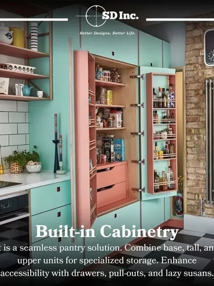 An example of built-in pantry cabinetry in a vibrant kitchen. This seamless solution combines tall and base units with pull-out drawers and door-mounted spice racks to maximize storage and accessibility.