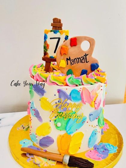 Birthday vibes painted bright and bold. A colorful art-themed cake for a 7th birthday.