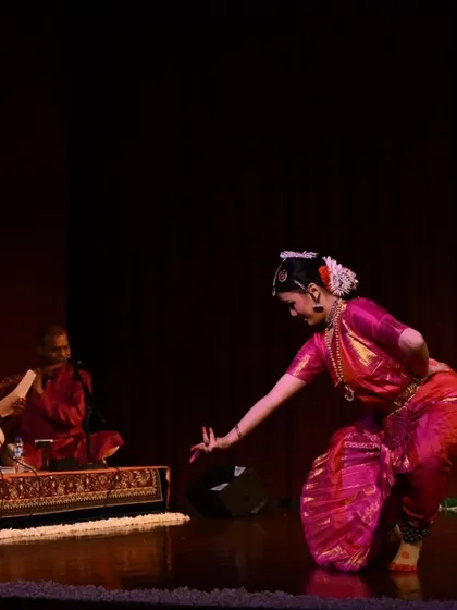 The dancer and the musician in perfect harmony. Stuti Mukherjee performs while the harmonium player provides the melodic framework, a beautiful illustration of the collaborative nature of a live recital.