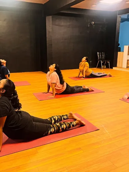 We also slow things down with power yoga. This is a shot from a cool-down session, focusing on poses like the upward-facing dog to improve flexibility and build core strength.