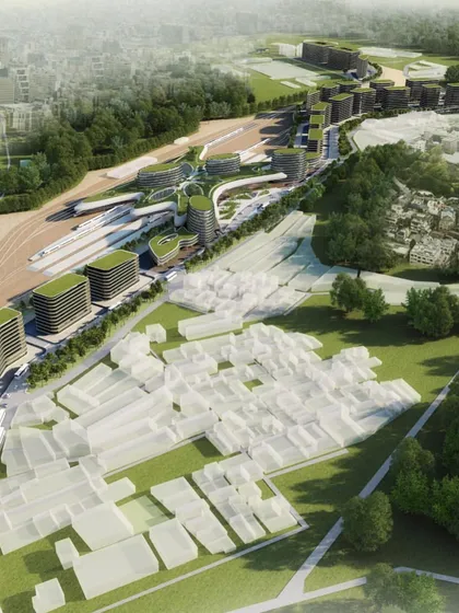 A masterplan view showing the integration of the new station and development with the existing urban fabric and railway lines.