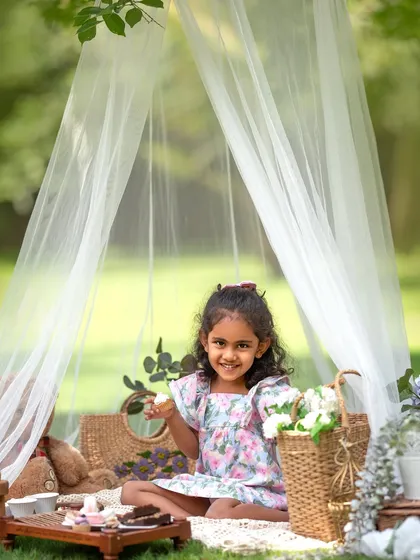 A lovely picnic setup with a sheer canopy. This is from a session with a long-time client, and it's so special to see her grow.