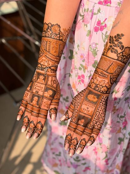 Another angle of the grid-pattern baby shower mehendi, showing the fine details and clean lines.