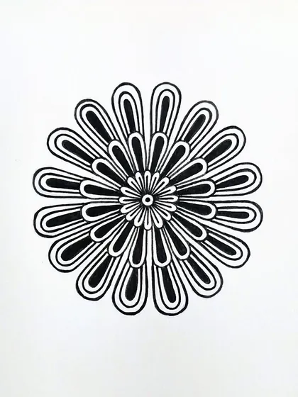 A simple, bold floral design. The clean, repeating loops create a dynamic and modern-looking mandala.