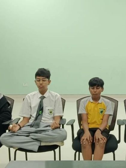 Students practice seated meditation to enhance their focus and mental calmness. We integrate mindfulness techniques into our youth programs to teach them how to manage pressure and maintain concentration.