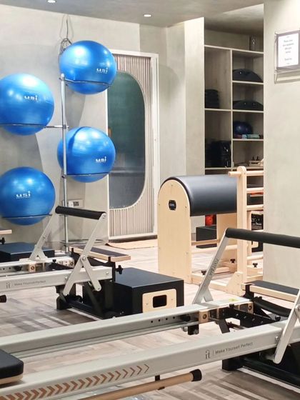 A sneak peek into our Greenpark studio, where you'll find a bright and airy space filled with top tier equipment like reformers and stability balls.