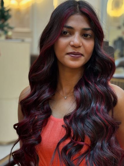 A close-up of the red wine transformation, highlighting the beautiful blend of red and dark tones.