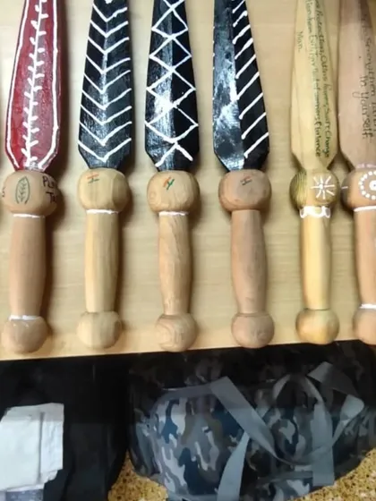 A closer look at the hand-painted training knives. The art on them reflects the spirit of the warrior.