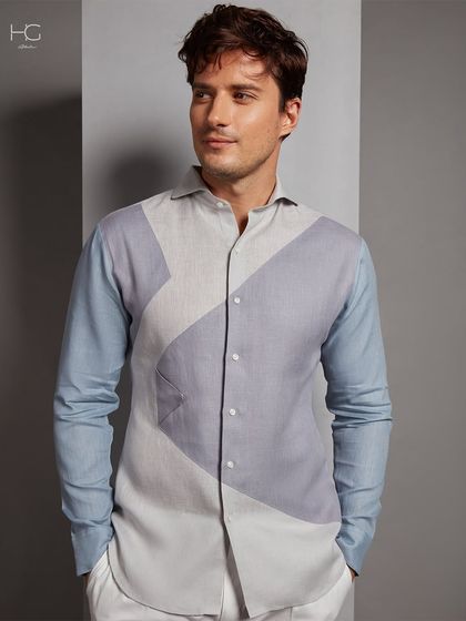 A different angle of the color-blocked shirt, showing how the geometric design creates a visually interesting and modern aesthetic.