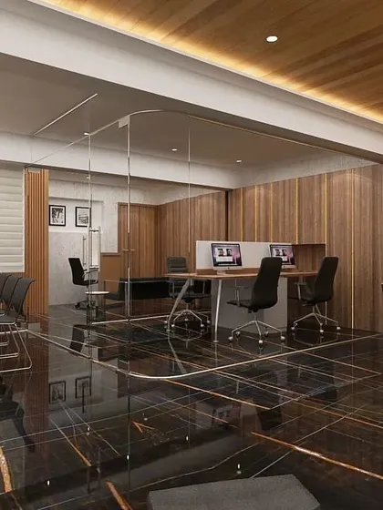 A visualization of a corporate office designed to make you forget working from home. The design features a play of dramatic lighting, curved glass partitions, and rich textures like black marble and warm wood.