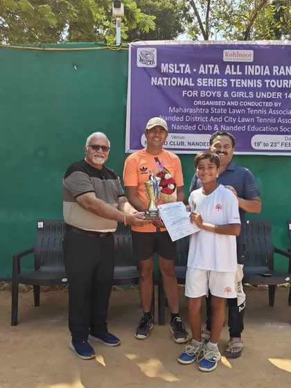 The prize distribution ceremony at the MSLTA-AITA National Series in Nanded. Aarav Chhallani receives his winner's trophy for the U-14 category.