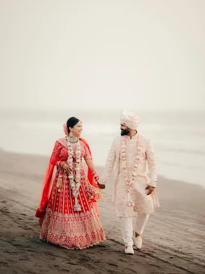 A romantic walk on the beach. We love capturing these simple, beautiful moments for our destination wedding couples.
