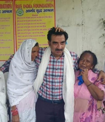 Receiving blessings from the elders at Anand Vriddha Ashram. Their affection is a priceless reward for my service.