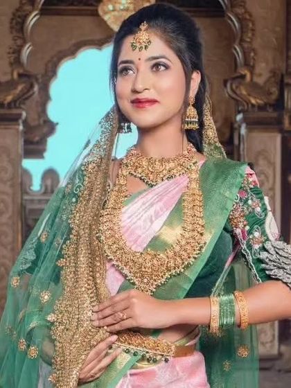 The full ensemble, including the embroidered veil, creates a unique and memorable bridal look.