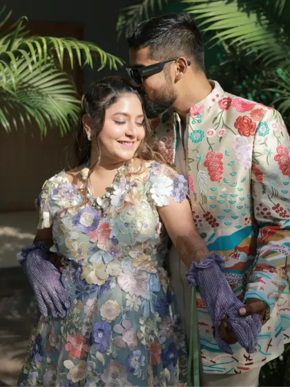 An intimate and romantic shot of the couple. The bride-to-be's makeup is soft and glowing, enhancing her natural beauty.