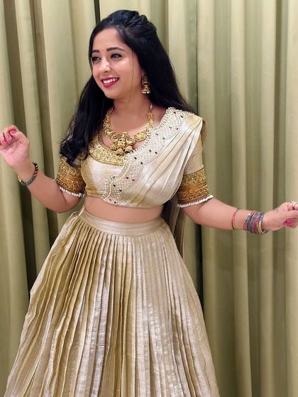 A playful pose that shows the fun side of wearing traditional clothes. They are meant to be enjoyed.